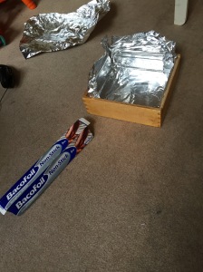 DIY shielding.  Bacofoil, no less - only the good stuff here.